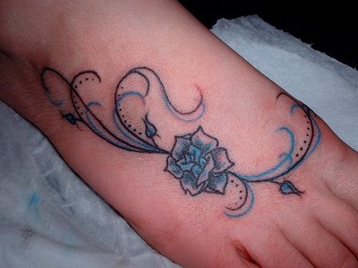 Flowers and Butterfly Foot Tattoo