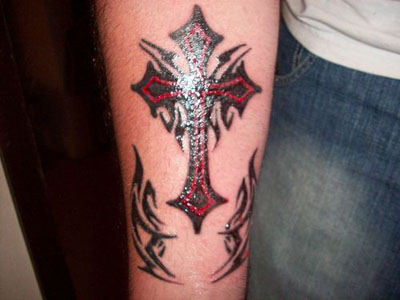been very hard pressed to find anyone wearing a Christian tattoo were