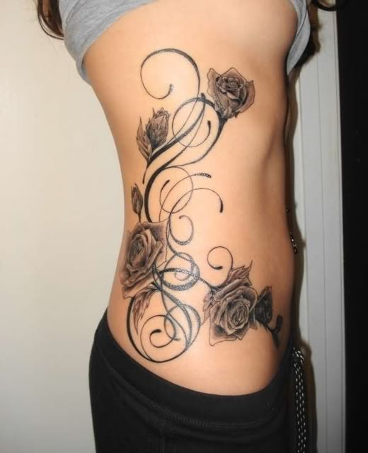 small rose tattoos for girls. small black and white tattoos