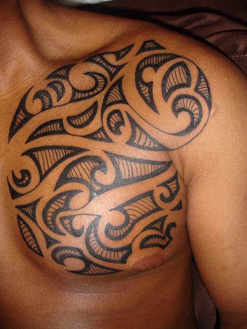 maori tattoo feet