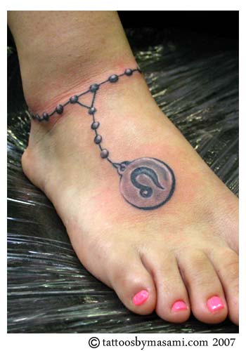 angelina jolie wanted tattoo. Hot looking Leo Foot Tattoo Source: