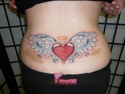 cross tattoos with wings on back. angels wings tattoos.