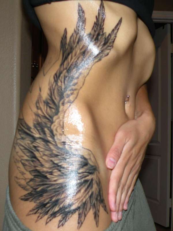 angel wings tattoo photos submitted to RankMyTattoos.com …