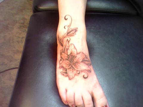 woman foot tattoos
